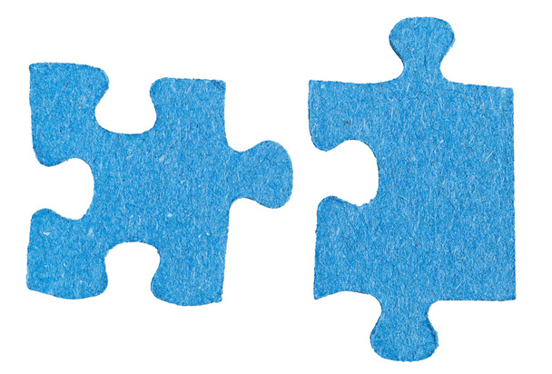 Deux pièces de puzzle sepatées
 - Photo, image