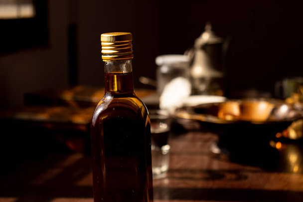 Bottle glass of olive oil - Foto, afbeelding