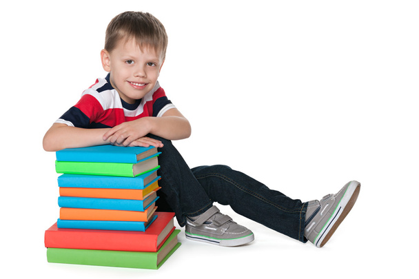 Cute boy with books - Foto, afbeelding