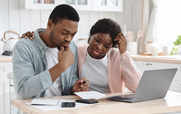 Stressed Black Couple Calculating Family Budget In Kitchen, Suffering Financial Crisis - Photo, Image
