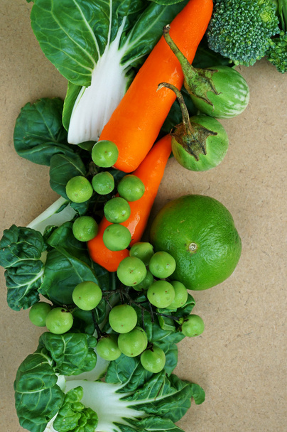Fresh organic vegetables on wooden vintage table - Photo, Image