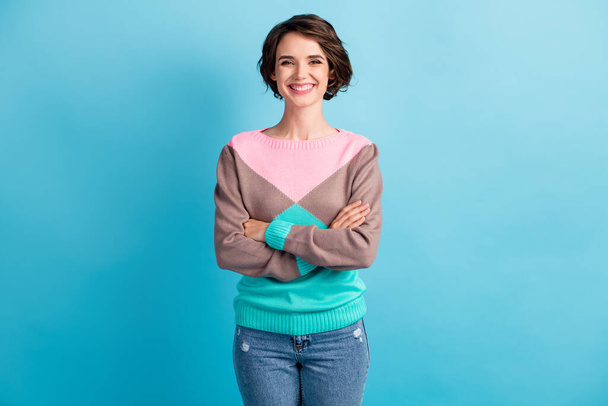 Photo portrait of cheerful girl with folded arms isolated on pastel light blue colored background - Φωτογραφία, εικόνα