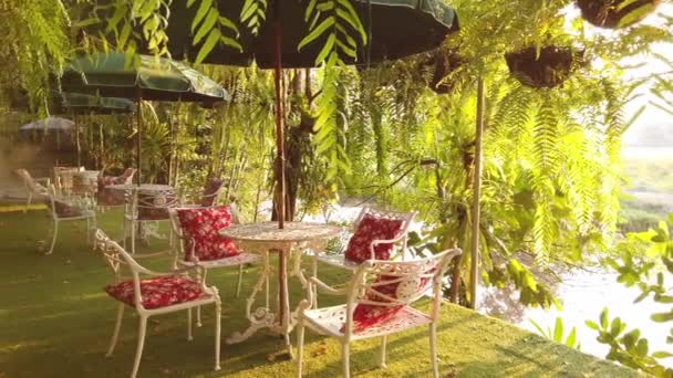 Table and chairs in garden. - Footage, Video