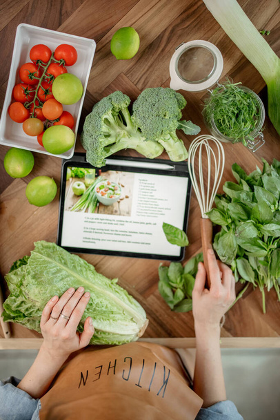 Recipe of healthy salad on digital tablet  - Photo, image