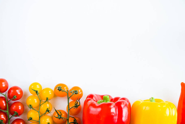 All color bell pepper, green spacy pepper and cherry tomatoes, colorful vegetables background, raw ingredients - Fotó, kép