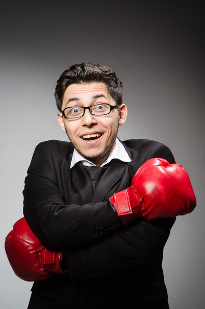 бізнесмен з боксерськими рукавичками
 - Фото, зображення