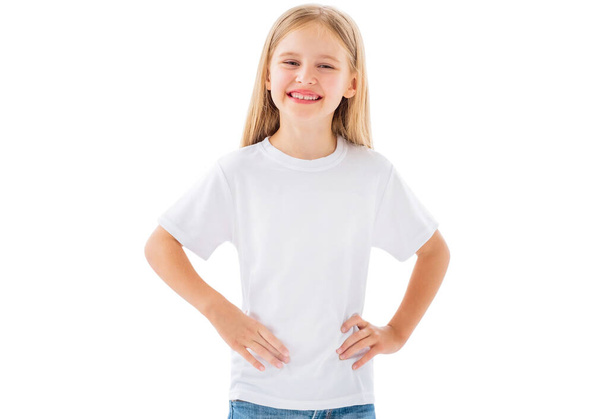 Little girl in new white t-shirt - Fotó, kép