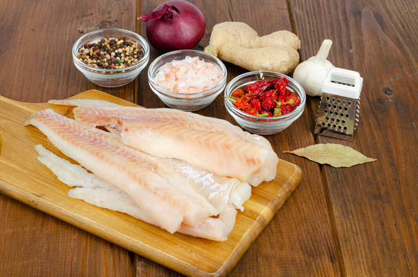 Frozen pollock fillet. Cooking fish dishes. Photo - Photo, Image