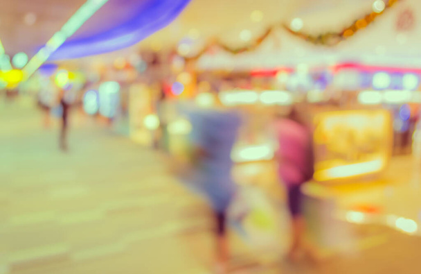 blurred image of shopping mall and people for background usage . - Photo, Image