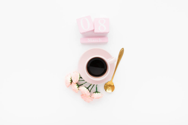 An overhead shot of a Women's day decoration set with a cup of coffee - Foto, afbeelding