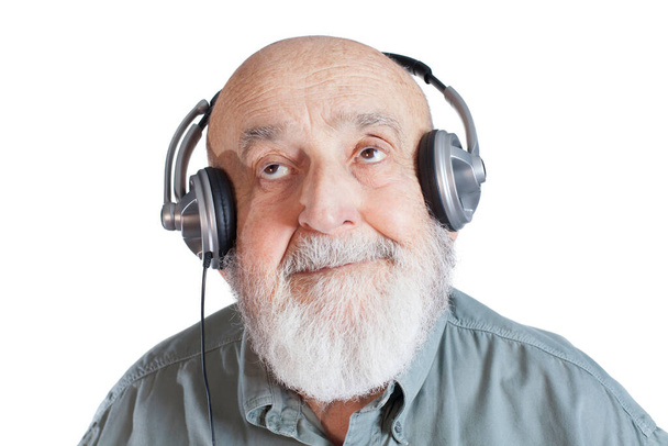 old man with headphones isolated on white background - Zdjęcie, obraz