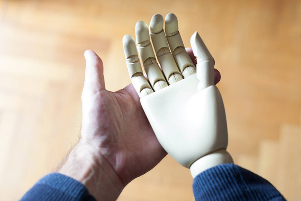 real and prosthetic hand - Fotó, kép