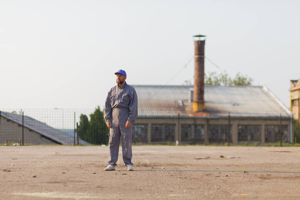 industrial manufacturing factory worker posing - Fotó, kép