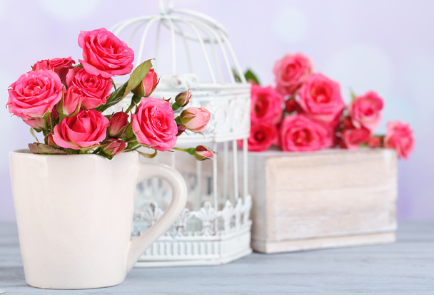 Beautiful small pink roses, on light background - Photo, Image