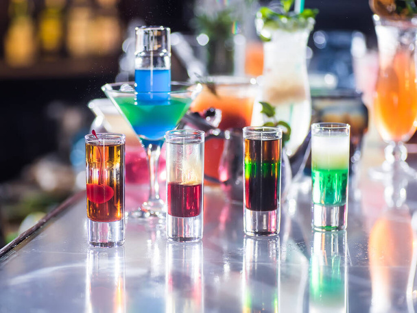 Multicolored cocktails on the bar - Foto, Imagen