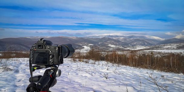 Shooting a landscape in the winter Carpathians - Photo, Image