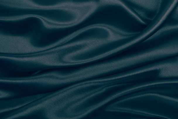 Smooth elegant dark grey silk or satin texture can use as abstract background. Luxurious background design - 写真・画像