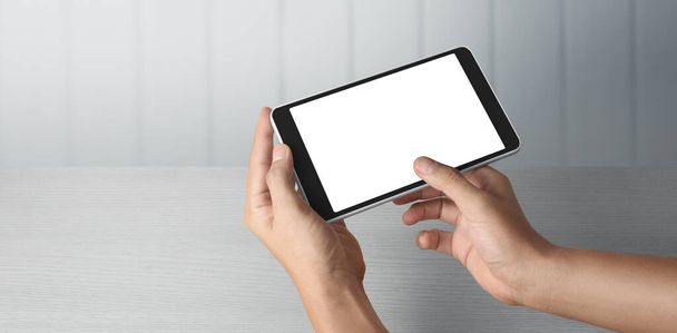 Hands holding  tablet touch computer gadget with isolated screen - Φωτογραφία, εικόνα