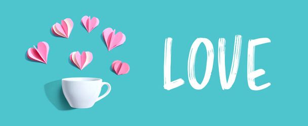 Love message with a coffee cup and paper hearts - Foto, Bild