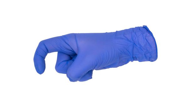 Ruka v modrých nitrilových rukavicích dělá gesto kožního háku. Nonverbální signál ruky pro dermatologickou operaci - Fotografie, Obrázek