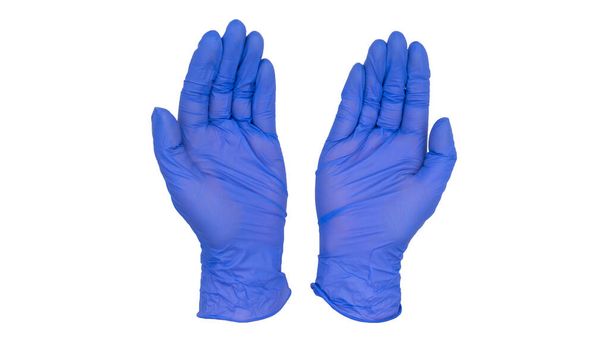 Ζευγάρι χεριών που φορούν μπλε γάντια εξέτασης νιτριλίου ενώνονται για να κάνουν μια ευγενική χειρονομία ανοιχτού χεριού. - Φωτογραφία, εικόνα