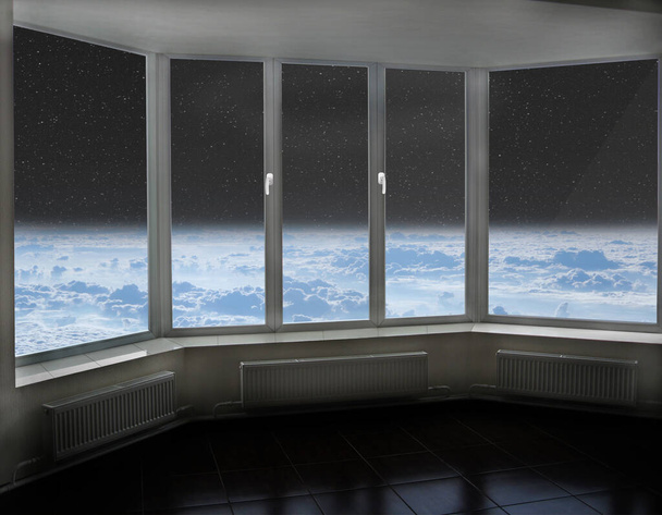 Raumfenster mit Blick auf den Weltraum über der Erdatmosphäre und dem Kosmos. Gemütliches Zimmer mit kosmischem Panorama aus dem Fenster. Blauer Himmel über der Erde aus dem Fenster gesehen - Foto, Bild