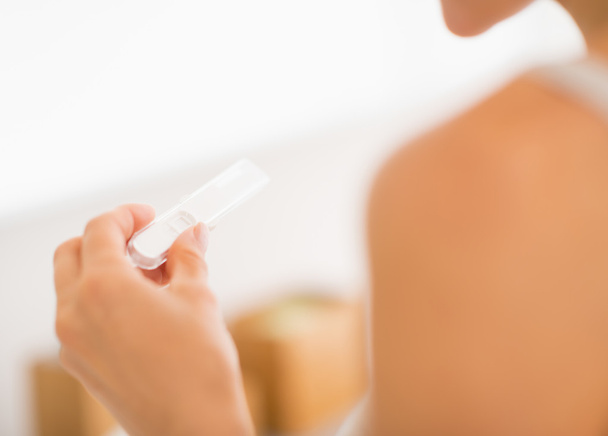 Woman looking on pregnancy test - Fotoğraf, Görsel