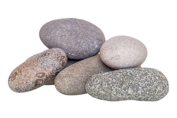 The stones are gray, isolated, stacked in a variety of compositions for use in collages, photographed in a studio in natural daylight, horizontally. - Photo, Image