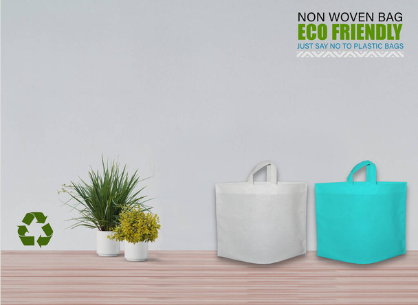 Empty Mockup Bags Isolated on Table with white background. ECO Bags. Copy Space for Text. - Photo, Image