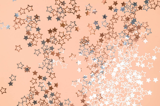 Confetti stars on orange background - Photo, Image