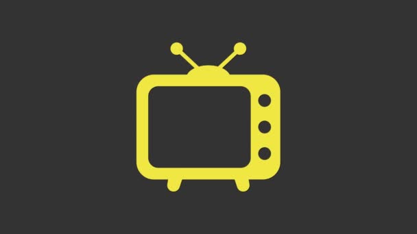 Žlutá ikona televize izolovaná na šedém pozadí. Televizní značka. Grafická animace pohybu videa 4K - Záběry, video