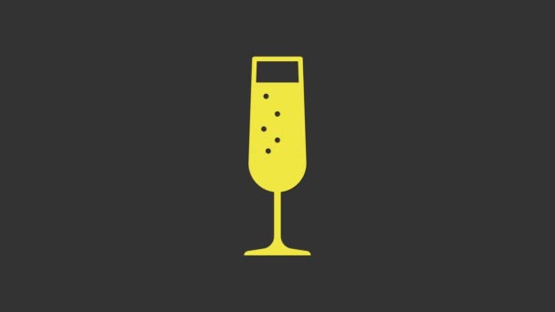 Žluté sklo ikony šampaňského izolované na šedém pozadí. Grafická animace pohybu videa 4K - Záběry, video