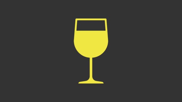 Keltainen viini lasi kuvake eristetty harmaalla pohjalla. Viinilasikuvake. Goblet-symboli. Lasinsirpaleiden merkki. 4K Video motion graafinen animaatio - Materiaali, video