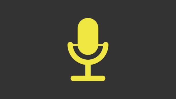 Icône de microphone jaune isolée sur fond gris. Sur micro micro radio. Signal haut-parleur. Animation graphique de mouvement vidéo 4K - Séquence, vidéo