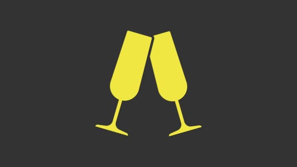 Žluté brýle s ikonou šampaňského izolované na šedém pozadí. Grafická animace pohybu videa 4K - Záběry, video