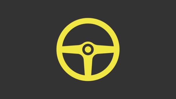 Κίτρινη εικόνα τιμονιού απομονωμένη σε γκρι φόντο. Εικονίδιο τροχού αυτοκινήτου. 4K Γραφική κίνηση κίνησης βίντεο - Πλάνα, βίντεο