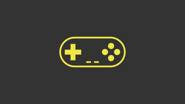 黄色のゲームパッドアイコンは灰色の背景に隔離されています。ゲームコントローラー。4Kビデオモーショングラフィックアニメーション - 映像、動画