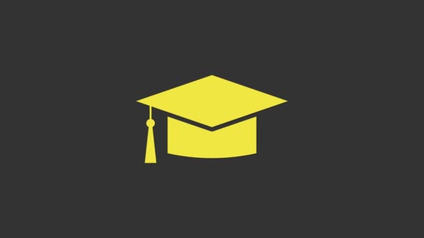 Keltainen Graduation korkki kuvake eristetty harmaalla pohjalla. Valmistumisen hattu tupsu kuvake. 4K Video motion graafinen animaatio - Materiaali, video