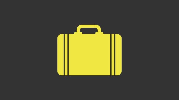 Yellow Suitcase for travel icon isolated on grey background. Traveling baggage sign. Travel luggage icon. 4K Video motion graphic animation - Footage, Video
