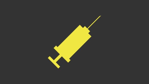 Icône de seringue jaune isolée sur fond gris. Seringue pour vaccin, vaccination, injection, vaccin antigrippal. Matériel médical. Animation graphique de mouvement vidéo 4K - Séquence, vidéo
