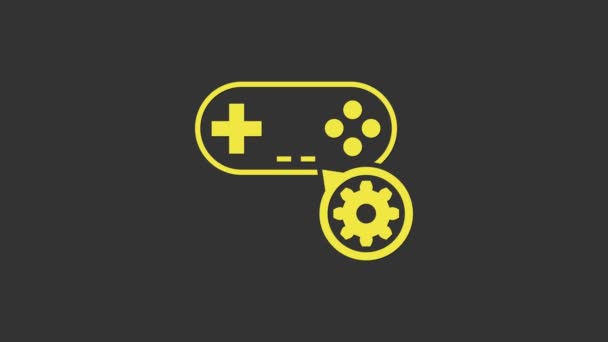 Gamepad giallo e icona ingranaggio isolato su sfondo grigio. Regolazione app, concetto di servizio, opzioni di impostazione, manutenzione, riparazione, fissaggio. Animazione grafica 4K Video motion - Filmati, video