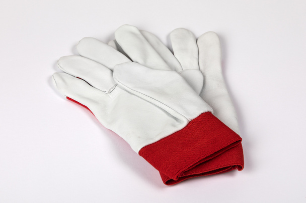 Δερμάτινα γάντια εργασίας σε λευκό φόντο - Φωτογραφία, εικόνα