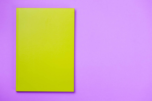 Green leather notebook on a pink background - Photo, Image