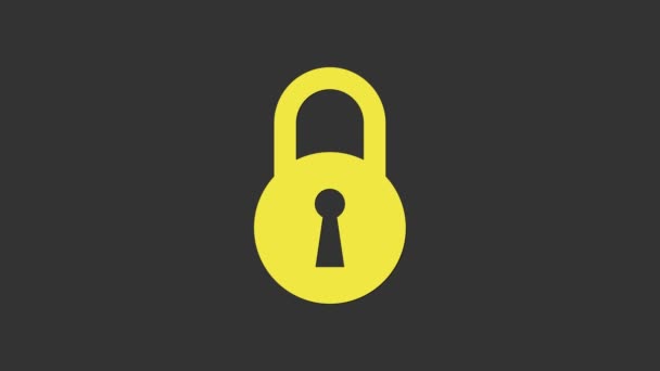 グレーの背景に黄色のロックアイコンが隔離されます。南京錠のサイン。セキュリティ、安全性、保護、プライバシーの概念。4Kビデオモーショングラフィックアニメーション - 映像、動画