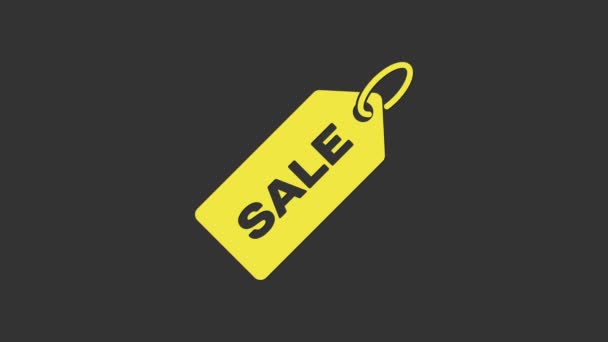 Žlutá cenovka s nápisem Prodej ikony izolované na šedém pozadí. Odznak za cenu. Promo tag sleva. Grafická animace pohybu videa 4K - Záběry, video