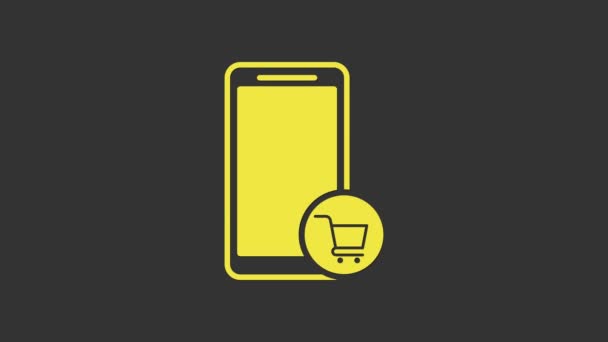 Желтый мобильный телефон и иконка для покупок выделены на сером фоне. Символ онлайн-покупки. Символ супермаркета. Видеографическая анимация 4K - Кадры, видео