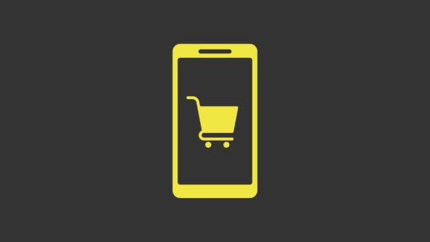 Желтый мобильный телефон и иконка для покупок выделены на сером фоне. Символ онлайн-покупки. Символ супермаркета. Видеографическая анимация 4K - Кадры, видео