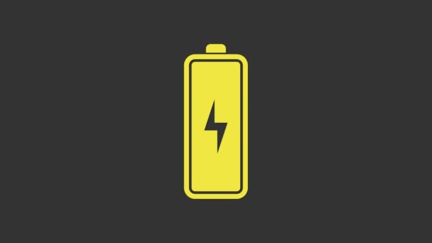 Sárga Akkumulátor ikon elszigetelt szürke háttér. Villámcsapás szimbólum. 4K Videó mozgás grafikus animáció - Felvétel, videó