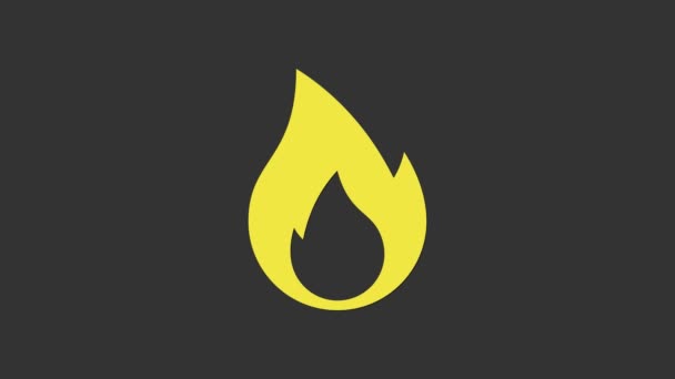 Žlutý plamen ikona izolované na šedém pozadí. Symbol tepla. Grafická animace pohybu videa 4K - Záběry, video