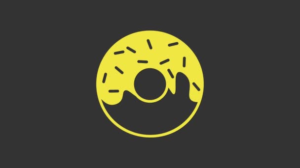 Sárga fánk édes máz ikon elszigetelt szürke alapon. 4K Videó mozgás grafikus animáció - Felvétel, videó